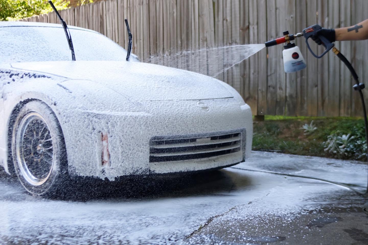 Nissan 350Z foam cannon pre-wash during exterior detailing