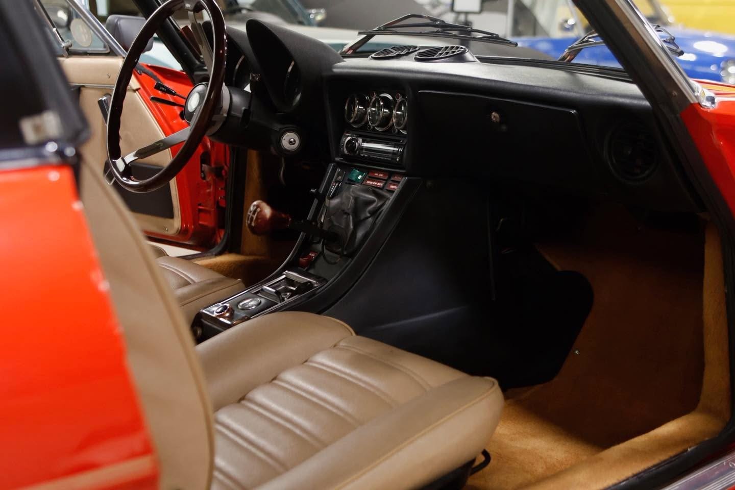 Alfa Romeo Spider tan leather interior after auto detailing