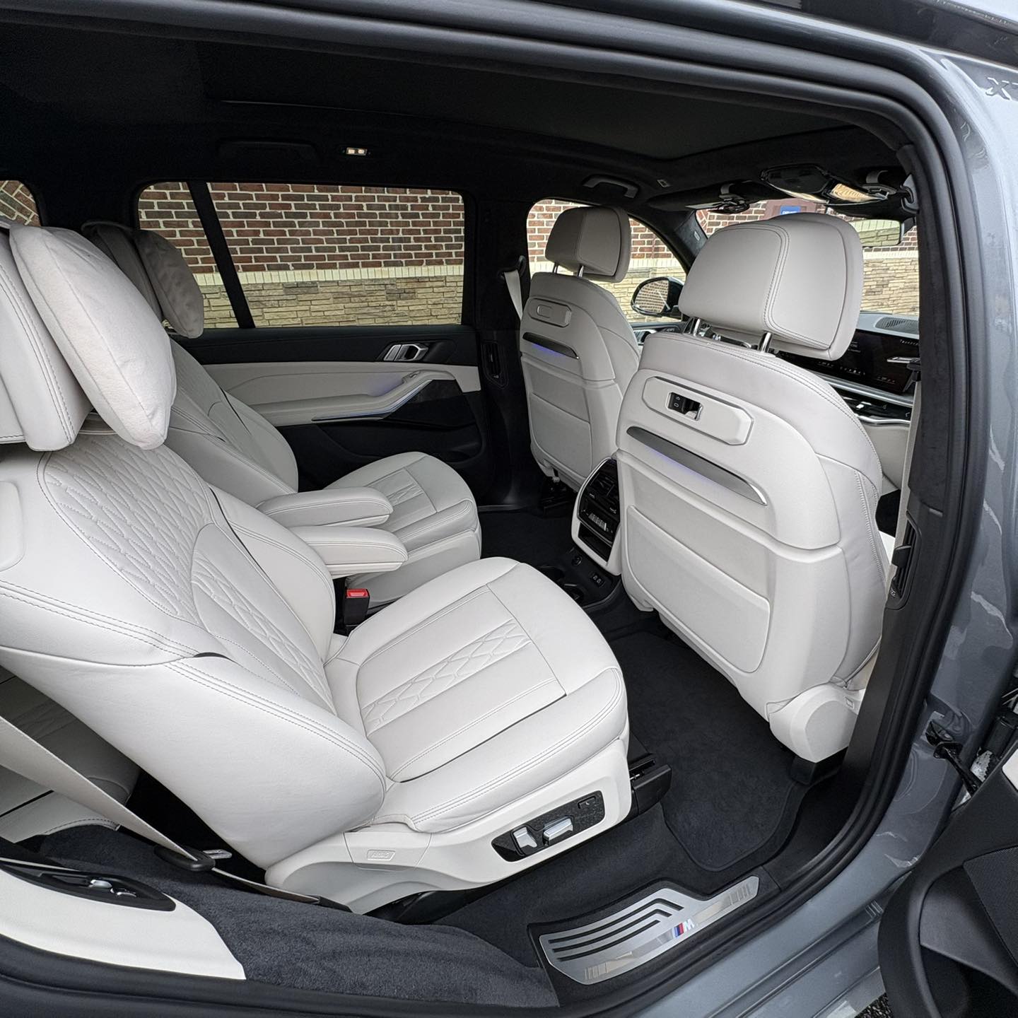BMW white leather rear seats after interior car detailing